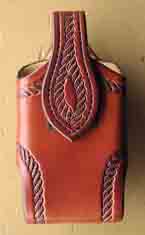 We make our cell phone cases in our Saddle Shop. If you don't see the size you need let us know the style and dimentions and we will make one for you. This case is designed for a LG Voyager phone.