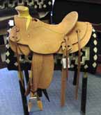 This Wade rough out saddle made by TIP is on the floor ready for your enjoyment. The cantle is 4